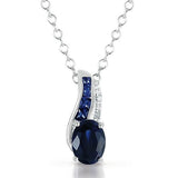 CREATED OVAL AND PRINCESS CUT SAPPHIRE AND DIAMOND PENDANT IN .925 STERLING SILV